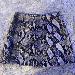 Snake print leather skirt